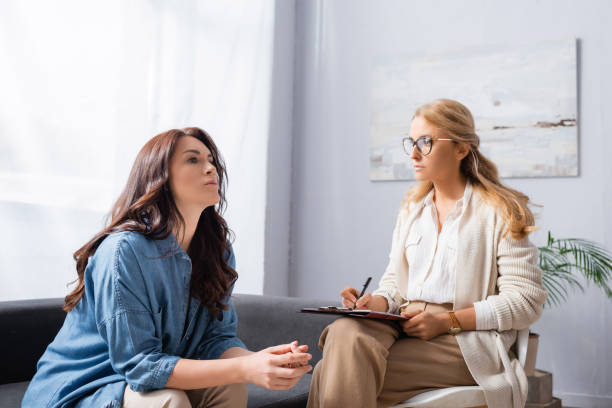 istock worried brunette woman with mental problem visiting therapist 1289637453