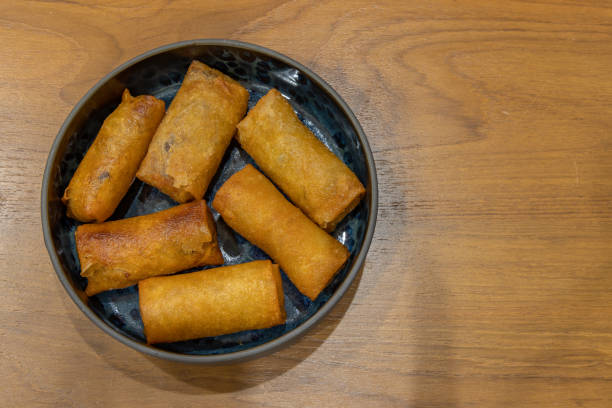 istock Fried traditional spring rolls food  in a Ceramic dishes. . 1289638744
