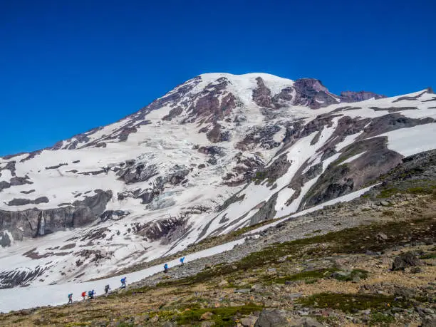 Hikers on the way to Camp Muir in Mount Rainier National Park in Washington state