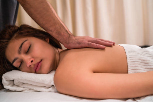 istock Young woman relaxing in the spa. 1289641898