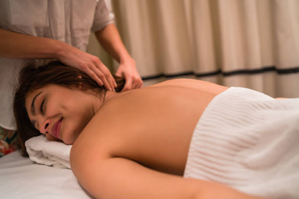 istock Young woman relaxing in the spa. 1289641900