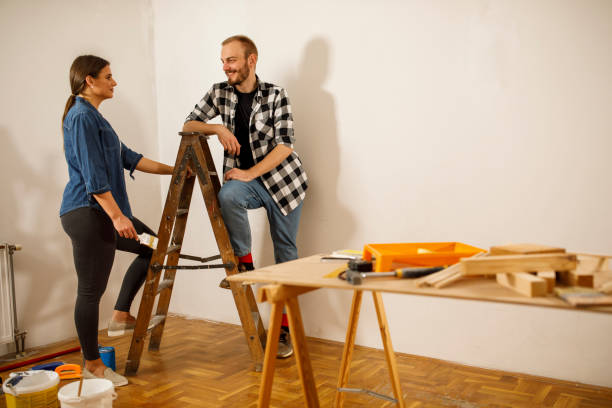 istock Taking a break from painting the walls in apartment 1289643142