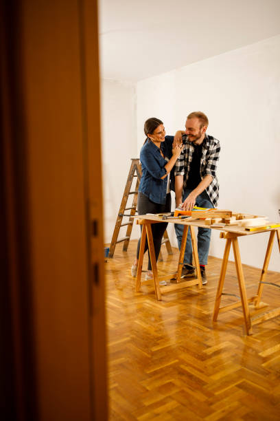 istock Romantic couple planning renovations in their new home 1289643231