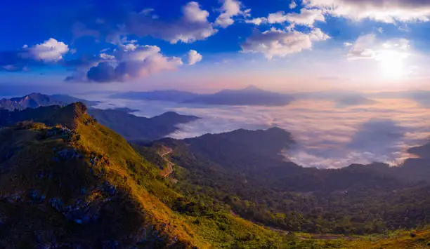Sunrise and misty at Doi Phatang viewpoint, Chiangrai province, Thailand
