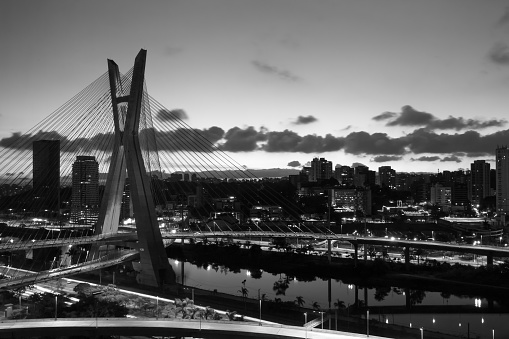 The Estaiada Bridge, on the Marginal do Rio Pinheiros, is one of the places with the highest flow of vehicles in the city of Sao Paulo, Brazil, today due to the coronavirus quarantine it is completely empty photographed in black and white.