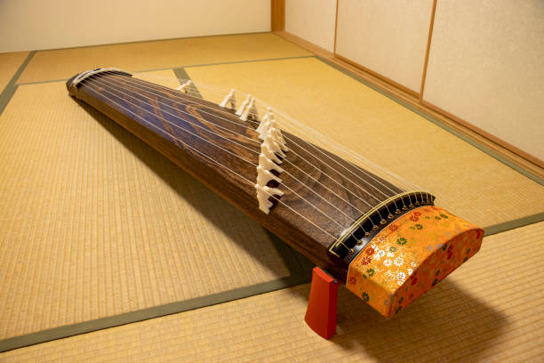 istock Koto, traditional Japanese musical instrument with many strings 1289651201