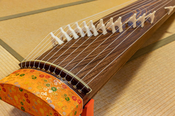 istock Koto, traditional Japanese musical instrument with many strings 1289651205