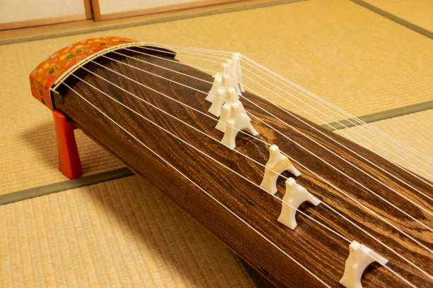 istock Koto, traditional Japanese musical instrument with many strings 1289651214