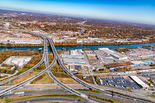 Image of Panorama Louisville city criss crossing roads, Ohio River, skatepark, baseball diamond aerial