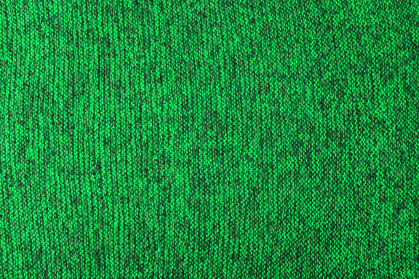 istock green and black melange knitted texture and flat background 1289663390