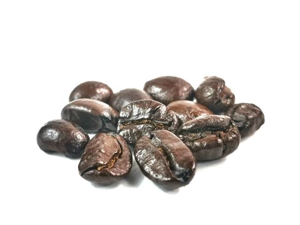 istock Coffee beans on white background. 1289663494