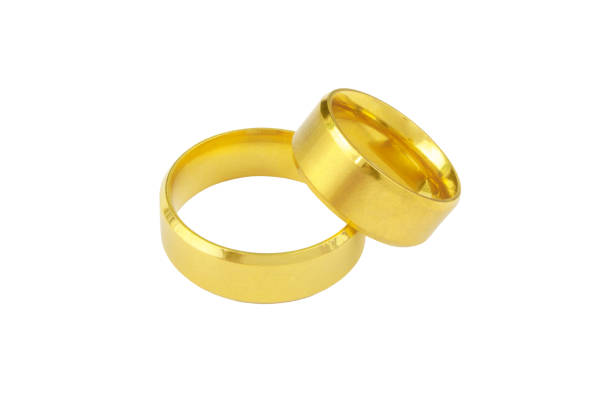 istock Golden wedding rings isolated 1289666714