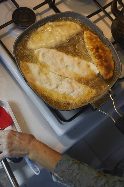 A type of fried dough made with flour, yeast, milk, eggs, margarine, salt, sugar and oil found in Central Asian and Middle Eastern cuisines