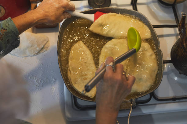 A type of fried dough made with flour, yeast, milk, eggs, margarine, salt, sugar and oil found in Central Asian and Middle Eastern cuisines