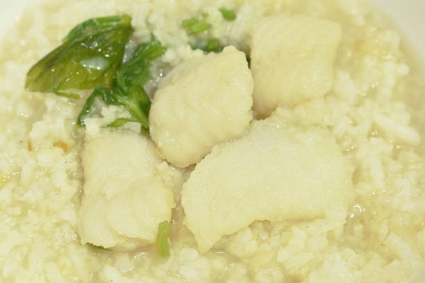 istock boiled rice with slice bass fish in clear soup 1289673295