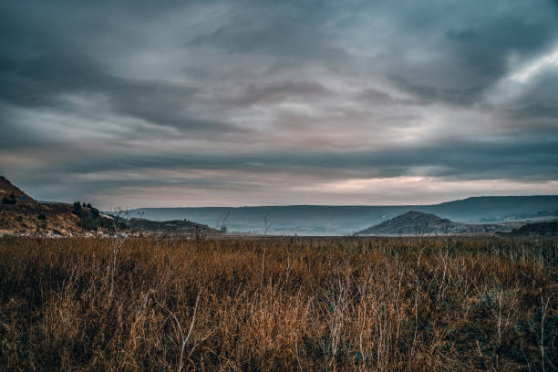 istock Moody morning rural landscape. 1289675713