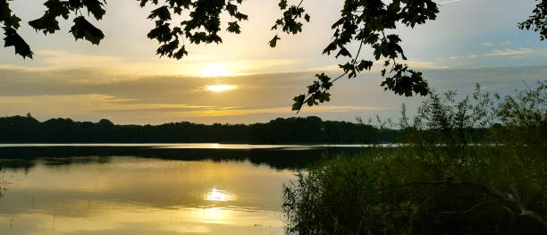 istock sunset over the lake 1289678869