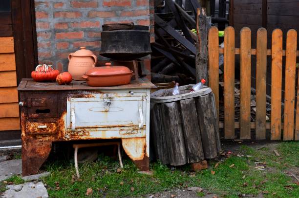 istock an old stove with old dishes 1289680889