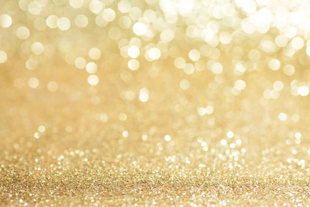 istock Shiny golden lights background 1289681265