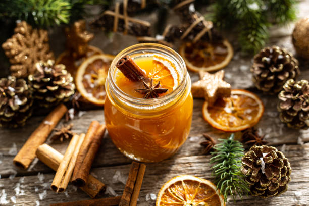 istock Christmas Punch with orange, rum and cinnamon sticks 1289682057