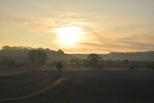 istock foggy sunrise in Eifel landscape 1289687244