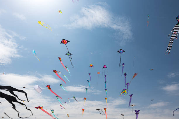 istock Kites with blue sky and white clouds 1289688275