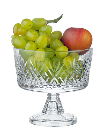 Glass fruit bowl / storage container isolated on white background