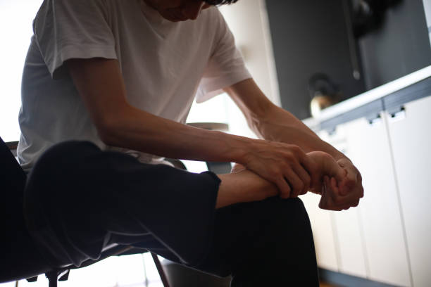 A man suffering from foot pain