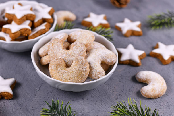 istock Crescent shaped christmas cookies called 'Vanillekipferl', a traditional Austrian or German Christmas biscuits with nuts and icing sugar in bowl 1289689378