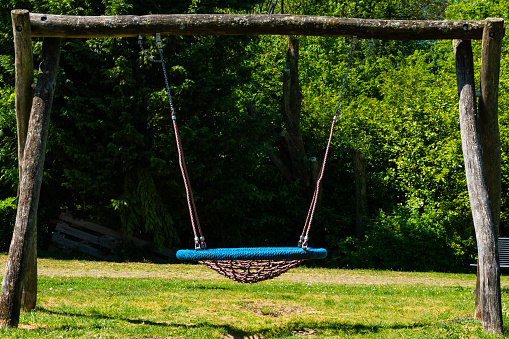 empty swing made of wicker