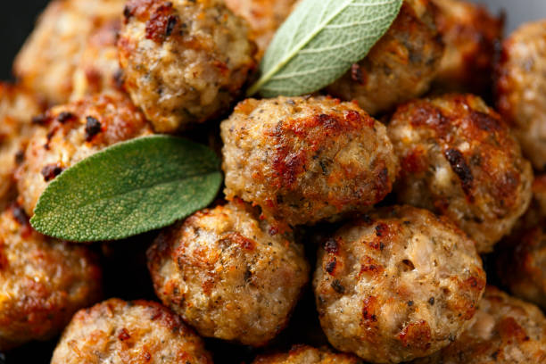 istock Pork stuffing meatballs with sage and onion in a black plate 1289690783