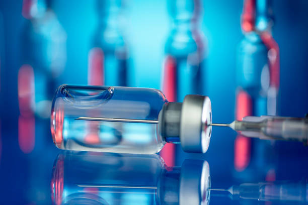 istock Vaccines and syringe in a laboratory 1289691481