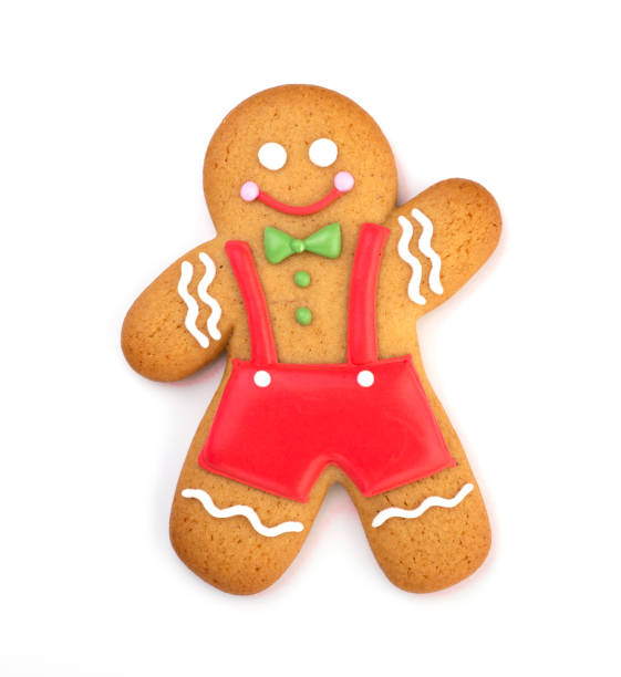 istock happy gingerbread man covered in icing isolated on a white background 1289693078