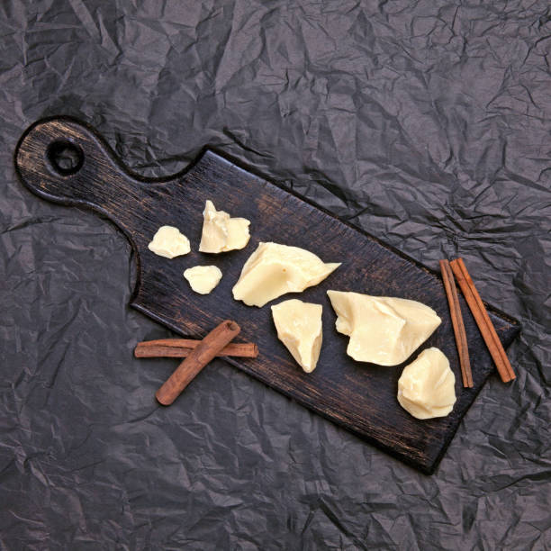 istock Pieces of natural cocoa butter with cinnamon 1289697323
