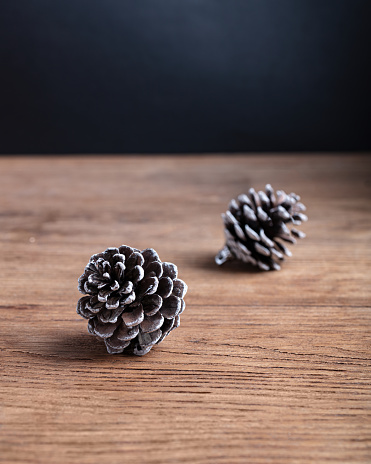 Pine cones on old wood