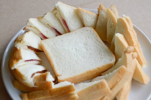 istock Bread food on wooden table 1289701045