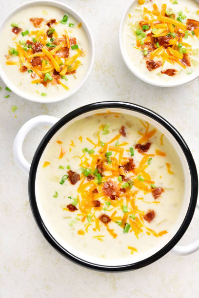 istock Potato creamy soup with bacon and cheddar cheese 1289701353