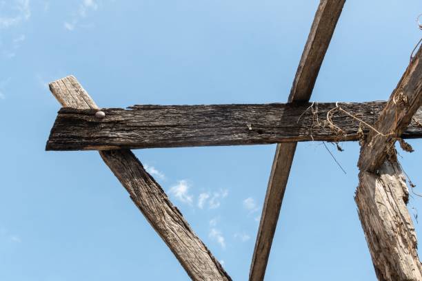 istock Old damage roof with blue sky and clouds images 1289702024