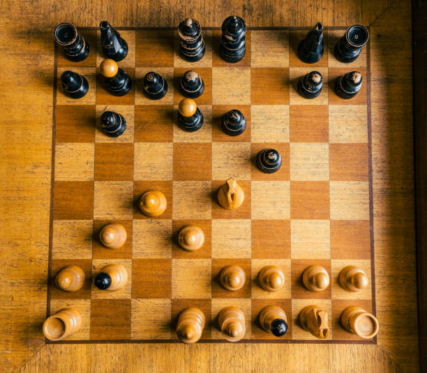 istock Chess game on the wooden board 1289702203