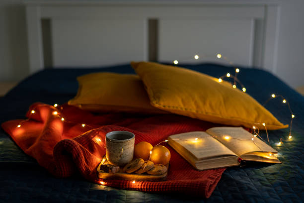 istock Cozy background for reading book relaxing and reflection. Stay home concept. Christmas decoration 1289703249