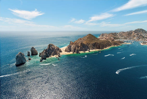 Land's End in Cabo San Lucas, Mexico Land's End in Cabo San Lucas, Mexico is the very tip of the Baja Peninsula. Cabo is a well-known tourist destination and popular with vacationers from the US and Canada. butte rocky outcrop photos stock pictures, royalty-free photos & images