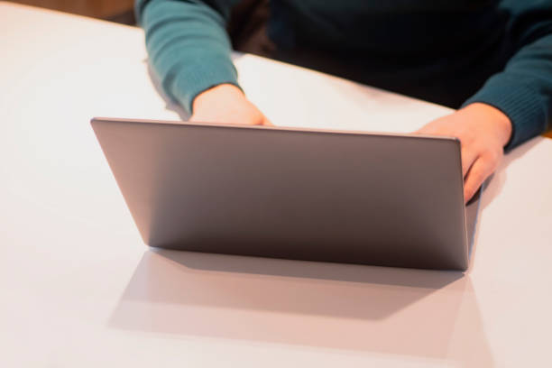 istock Male freelancer working on a laptop in the office. 1289705928