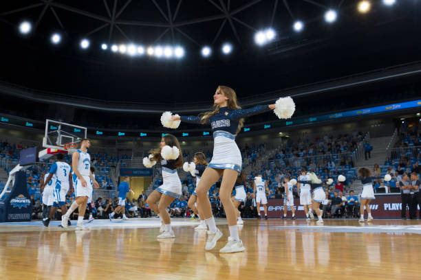 istock Cheerleaders performing in court 1289707390