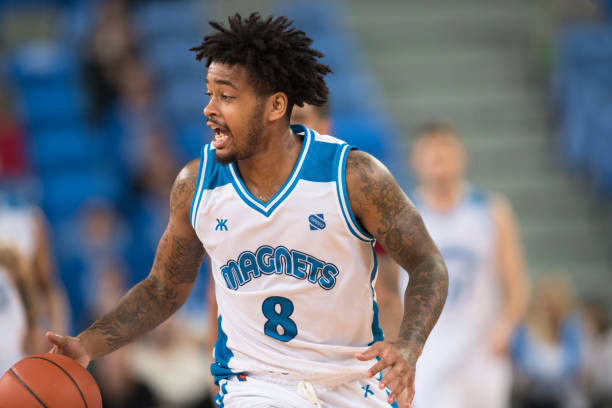 istock Basketball player playing in court 1289707402