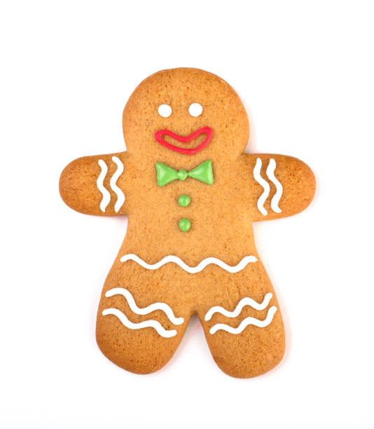 istock happy gingerbread man covered in icing isolated on a white background 1289707405