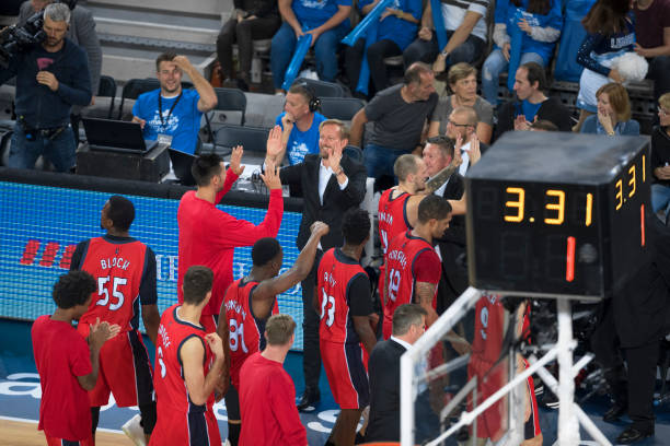 istock Basketball players celebrating their victory 1289707418