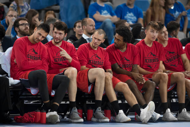 istock Basketball players sitting in stadium 1289707426