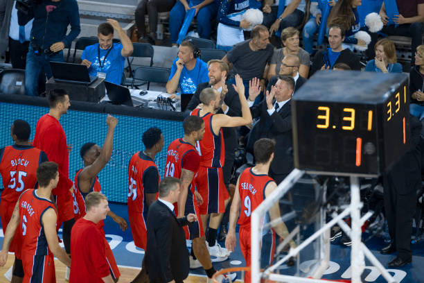 istock Basketball players celebrating their victory 1289707481