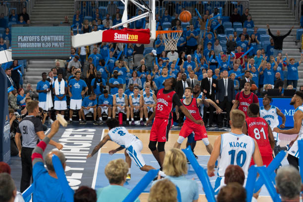 istock Basketball player aiming hoop 1289707489