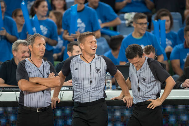 istock Referees standing in court 1289707551